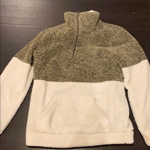 Woman’s fuzzy pullover sweater
